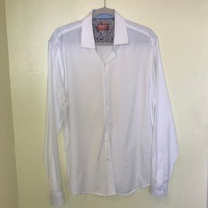 White dress shirt by Consequence .